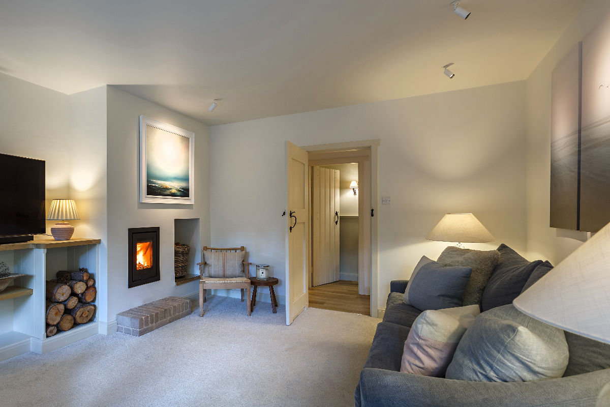 The Curlews sitting room and comfortable sofa