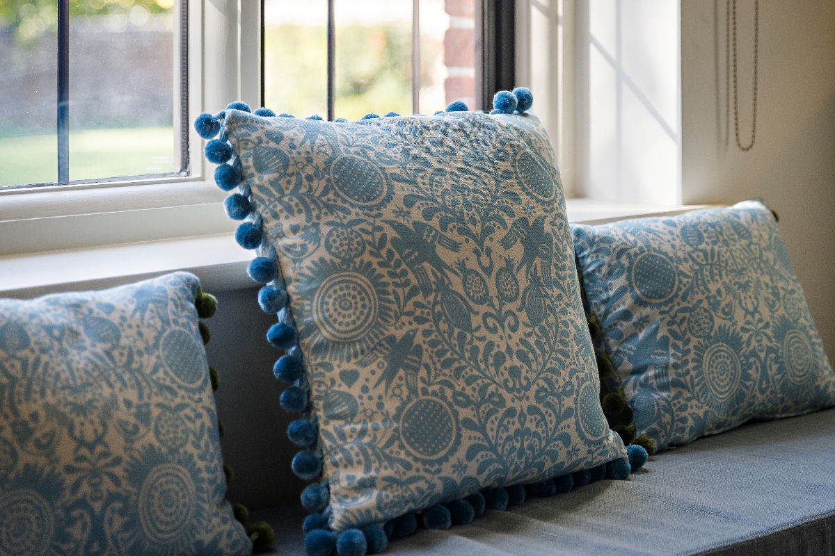 The Curlews cushions on window seat