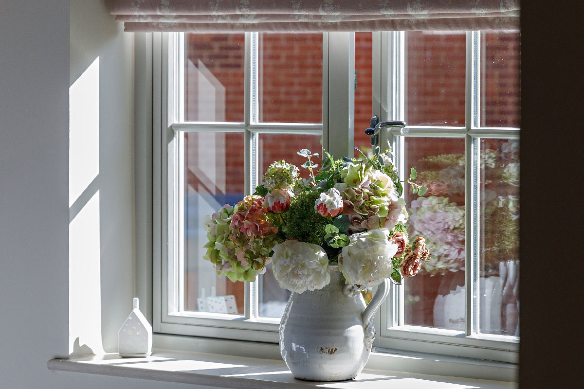 Seahorses pretty flowers in the window